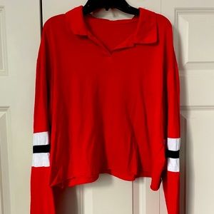 Red, white and blue cropped shirt.